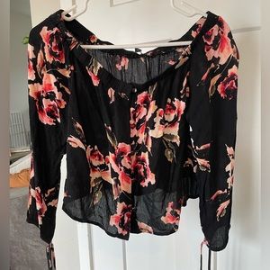 Off the shoulder long sleeve blouse with floral pattern